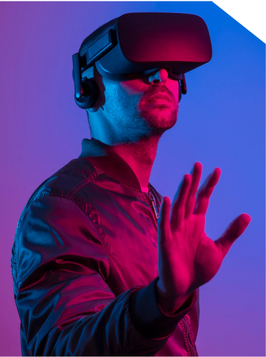 Man reaching forward while wearing a VR headset